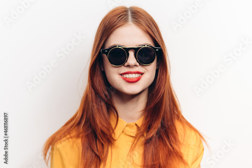 fashionable woman wearing sunglasses red lips charm