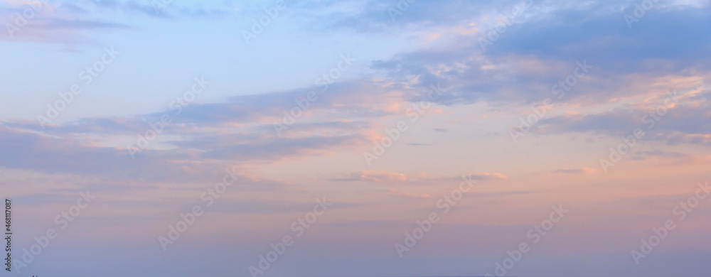Beautiful clouds in the twilight on clear sky. Banner