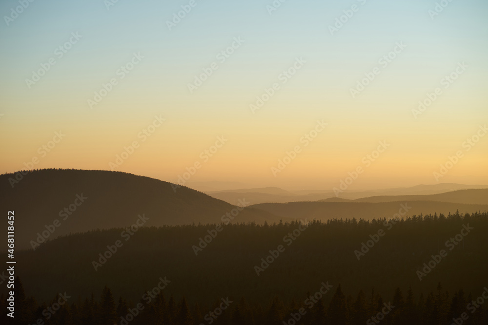 Landscape view on mountains in evening, sunset time.