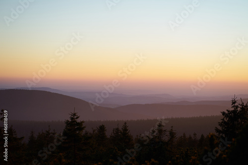 Pink colors of sunset in mountains landscape view.