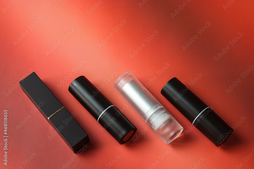 Close-up of lipstick on a red background Close-up of lipstick on a red background