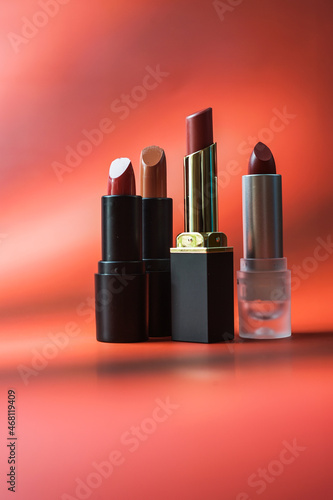 Close-up of lipstick on a red background