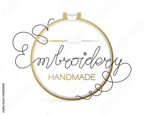 Embroidery hoop, needles. Embroidery. Handmade. Golden needle with thread on white background.