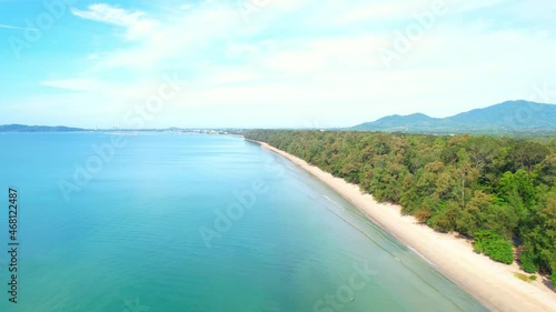 Wallpaper Mural 4K aerial view from a drone. Beautiful scenery of the coast with many pine trees.  mountains in the background. Bright weather of tropical seas in Rayong Province, Thailand
 Torontodigital.ca