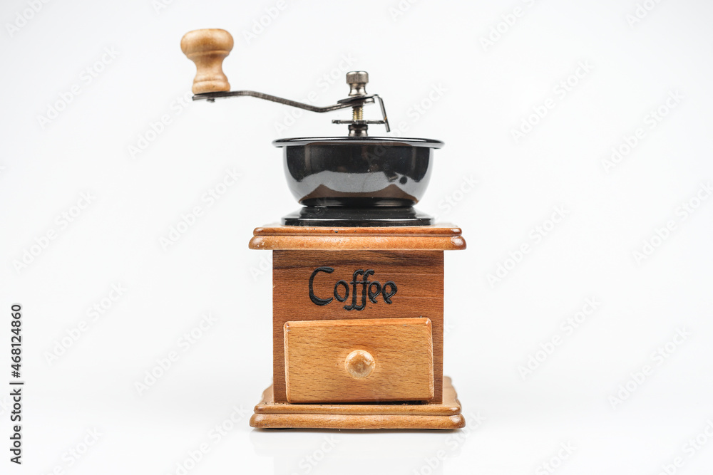 Image of making coffee. Coffee grinder on white background
Image of making coffee. Coffee grinder on white background