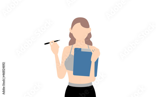 クリップボードに書き込むスポーツジムインストラクターの女性