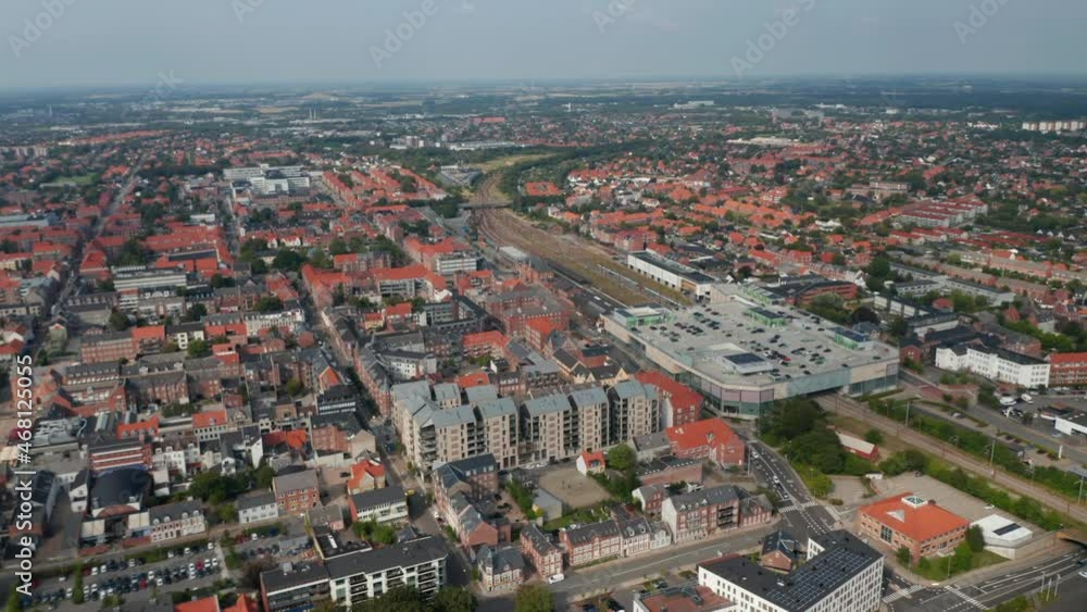 Aerial stunning view of Esbjerg, Denmark. Panning drone view over the characteristic brick buildings of one of the most important North Sea seaport Aerial stunning view of Esbjerg, Denmark. Panning drone view over the characteristic brick buildings of one of the most important North Sea seaport