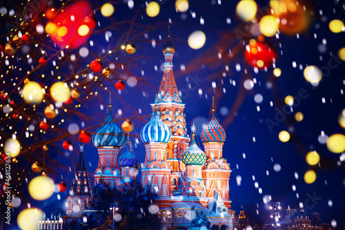 Christmas holidays St Basils Cathedral new year background bokeh. Winter Moscow Russia Red square with snow