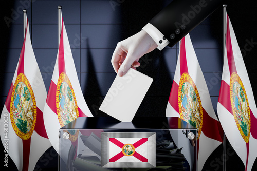 Florida flags, hand dropping ballot card into a box - voting, election concept - 3D illustration photo