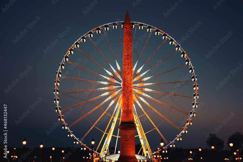 Place de la Concorde at nightfall. Ferris wheel and Egyptian obelisk. Paris, France. Retro