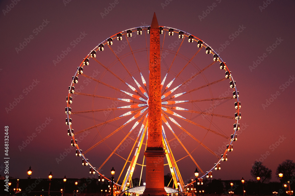 Place de la Concorde after sunset Ferris wheel and Egyptian obelisk. Paris, France. Retro	