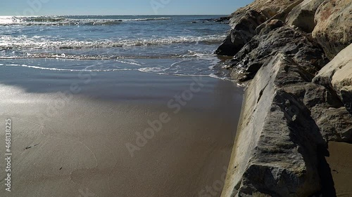 Wavy sea on the coast of the Mediterranean. Antalya beaches with golden sand and clean sea.