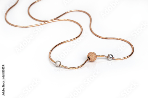 gold chain on white background
