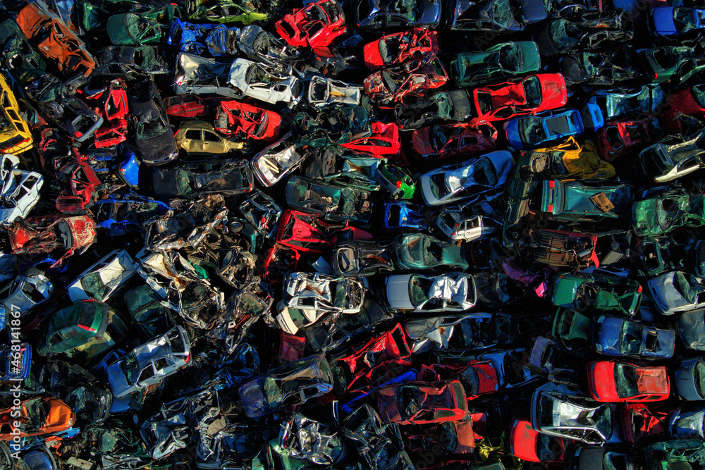 junkyard and lots of colorful car wrecks	