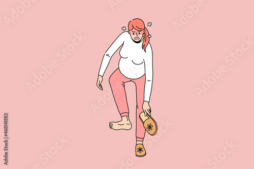 Angry pregnant woman bend with huge belly try wear sleepers. Unhappy mad mom to be suffer from last month pregnancy outcomes and problems, unable to dress. Flat vector illustration. 