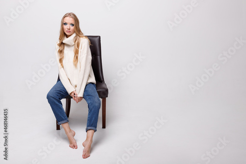 model in casual clothes on a gray background