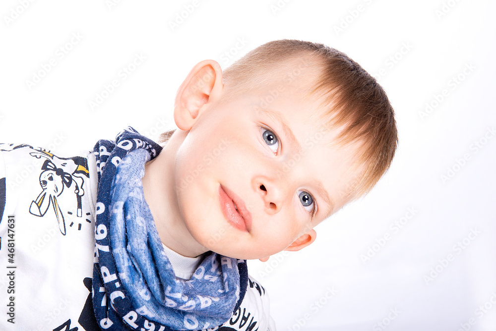 Close-up face portrait of happy joyful beautiful little boy isolated on white background Close-up face portrait of happy joyful beautiful little boy isolated on white background