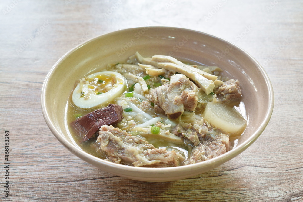 Vietnamese rice noodles or Pho with slice sausage and pork bone soup on bowl Vietnamese rice noodles or Pho with slice sausage and pork bone soup on bowl