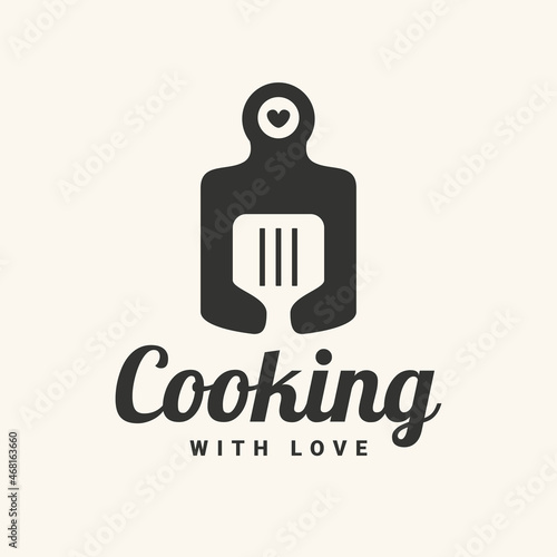 Cooking with love logotype with  spatula and heart icon. Vector illustration.