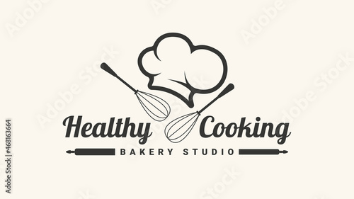 Healthy Cooking logo with chef hat and whisk. Vector illustration logotype for restaurant.