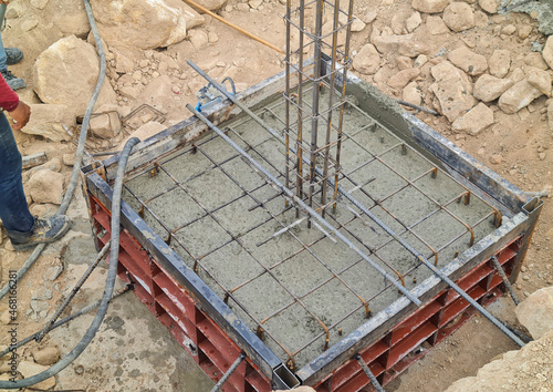 Concrete in a steel form poured concrete in the building construction area on the mountain