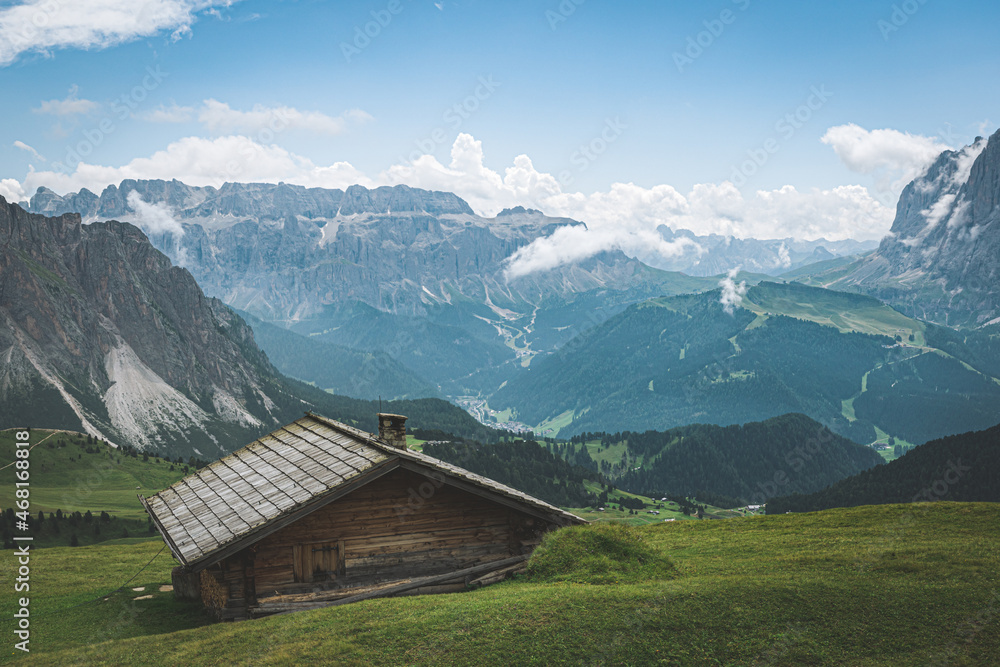 Tiny house at the foot of the Odle Mountains in the backdrop of the Seceda Mountains in the Dolomites, Trentino Alto Adige, Val di Funes Valley, South Tyrol in Italy