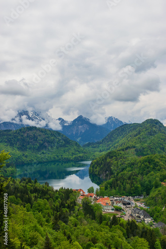 26 May 2019 Fussen  Germany - Hohenschwangau castle among green springtime Alpine mountains. Fussen village  Alpsee and Forggensee lake
