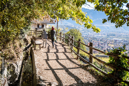 On the Algunder Waalweg (Water path of Lagundo) in Autumn over Merano in South Tyrol - Südtirol - in the alps of Trentino Alto Adige, Italy, Europe photo