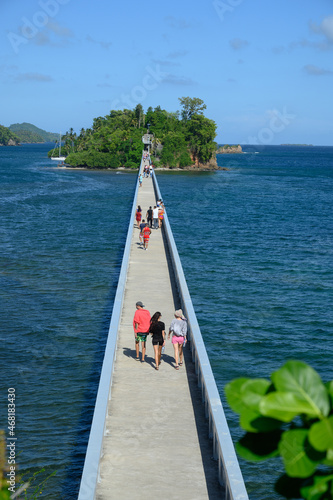 bridge beetween islands atlantic ocean landscape environment. HD photo shows a bridge between islands in the Caribbean. Samana city in the Dominican Republic. On the bridge you can see people, tourist