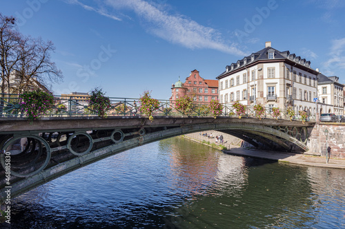 France, Strasbourg, Ill River canal with promenade and row of townhouses © Dmytro Surkov