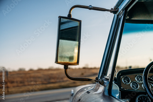 Mirror of an old rusty truck