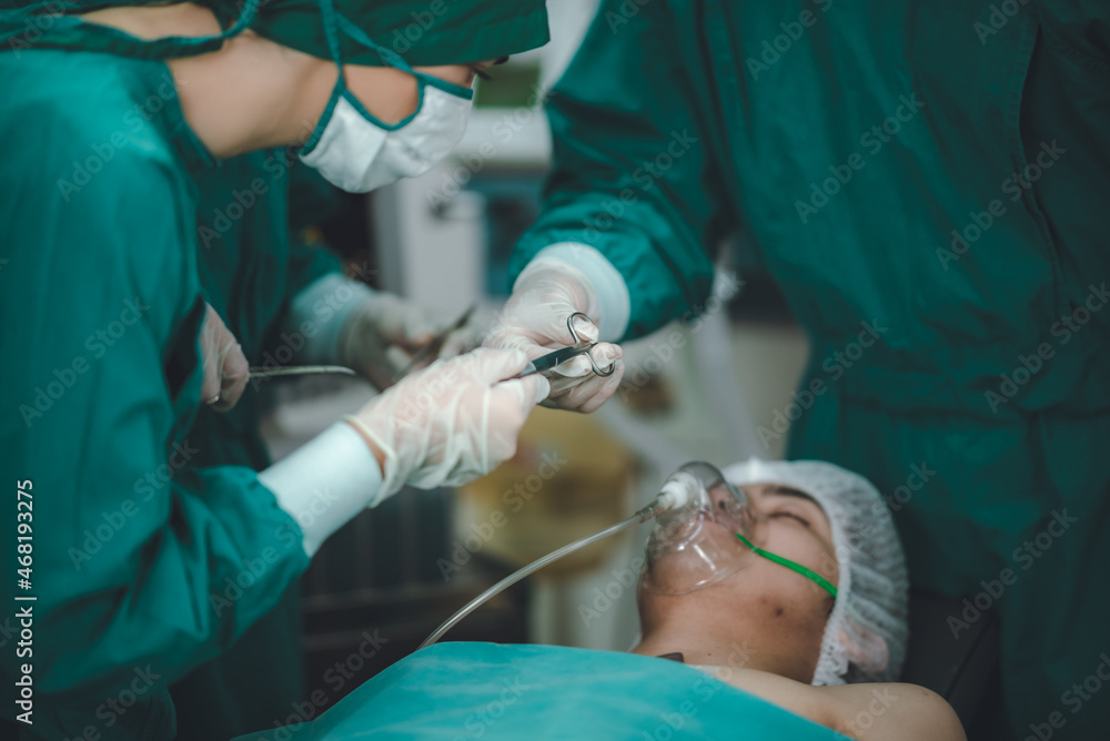 surgeon doctor team working in operation room at hospital, medical health clinic with specialist surgeon doctor team working in operation room at hospital, medical health clinic with specialist