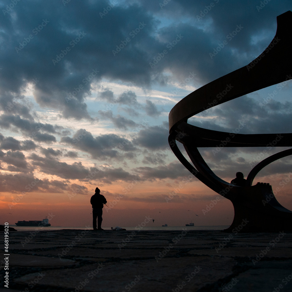silhouette of a person on the beach