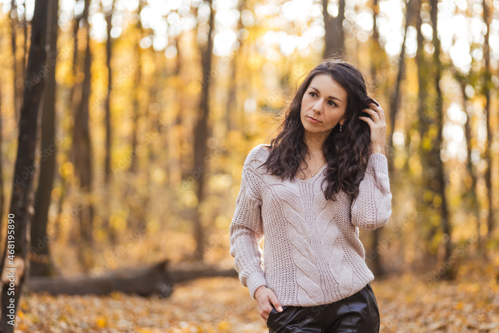 Close up Portrait of a funny brunette woman at the autumn forrest Close up Portrait of a funny brunette woman at the autumn forrest