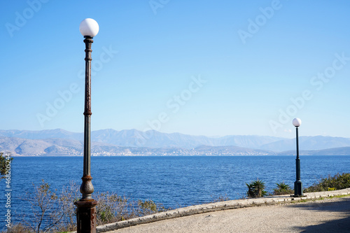 seaside promenade in Kassiopi, Corfu island, Greece photo