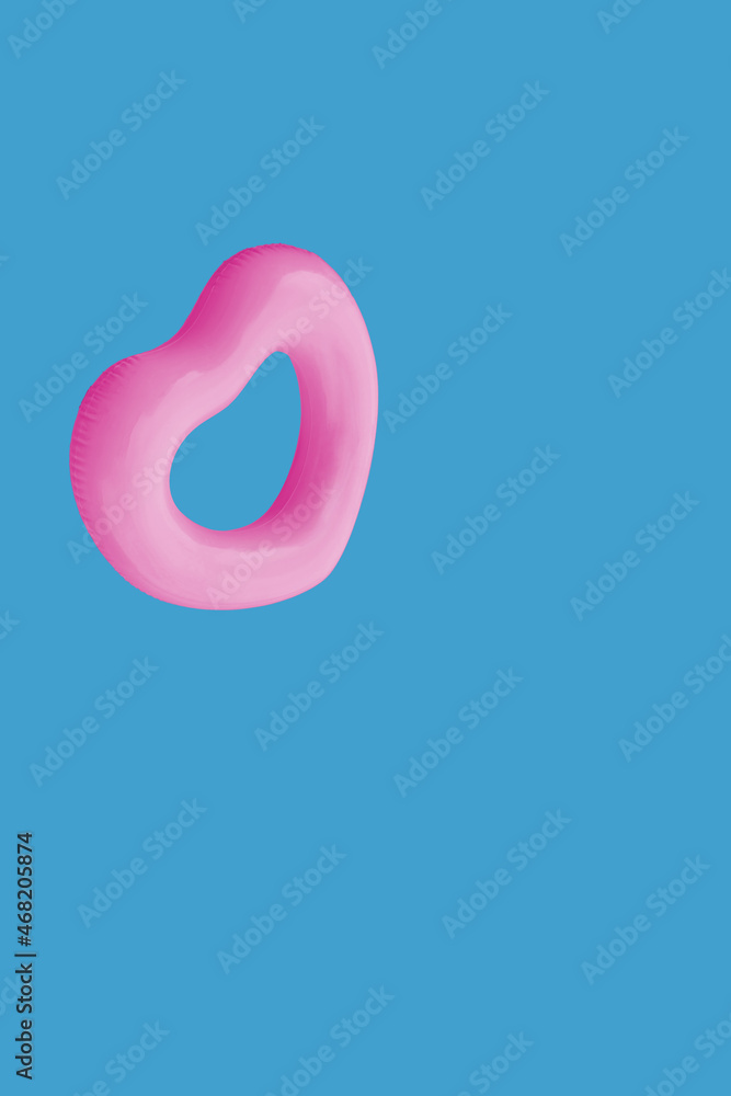 Fototapeta premium Pink Heart Tube on Blue Water