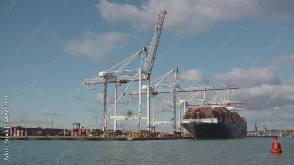 A container ship being loaded at Southampton Docks. A container ship being loaded at Southampton Docks.