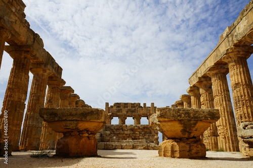 Ancient greek temple inside view on a summer cloudy day in Selinunte Archeological Park, Trapani, Sicily, Italy photo