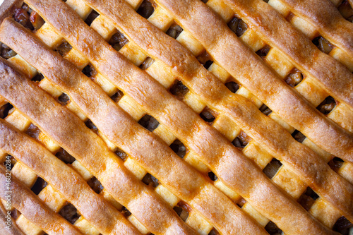 Homemade apple pie with red and green apples around (Turkish name; Elmali turta) photo