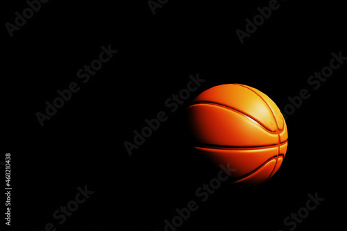 Basketball ball on black dark background. Mimimal sport concept. © Vlyaks