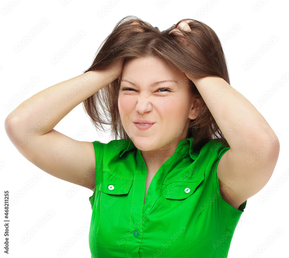 Teenage girl grimacing,girl making funny grimaces by clenching her teeth Teenage girl grimacing,girl making funny grimaces by clenching her teeth