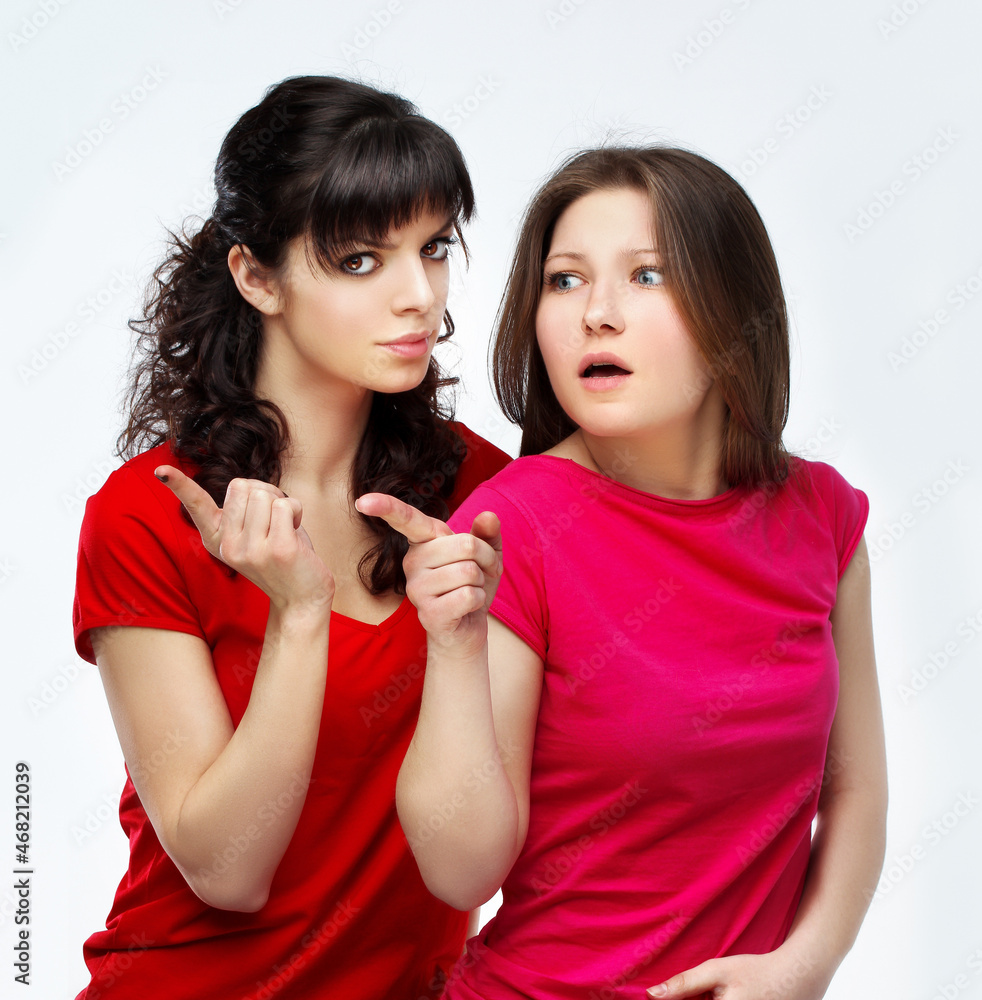 Happy friends  hugging each other.Teenage girl using smart phone.Selfie.Girl have fun .