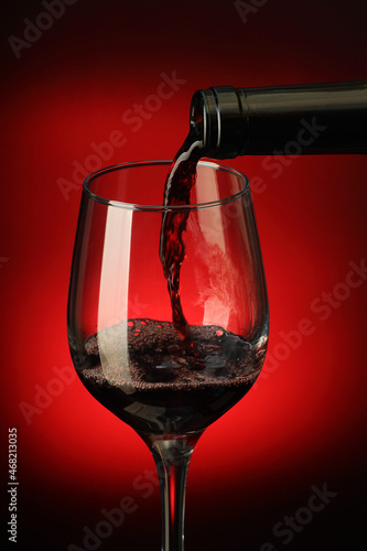 pouring wine into a glass