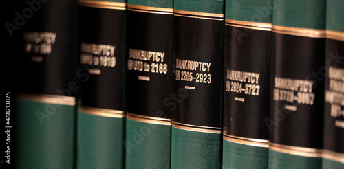 Vászonkép Bankruptcy Law Books on Shelf for Legal Reference