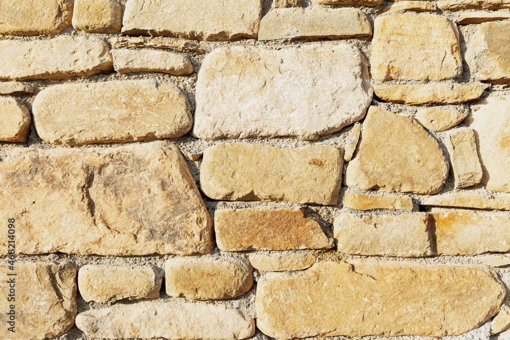 Wall surface made of decorative stone. Construction and repair. Background. Space for text. Wall surface made of decorative stone. Construction and repair. Background. Space for text.