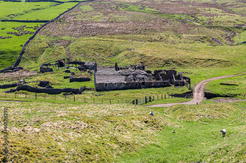 Abandonded buildings at Groverake Mine (lead and fluorspar) on the Pennines at Redburn Common near Rookhope in Weardale, County Durham UK photo