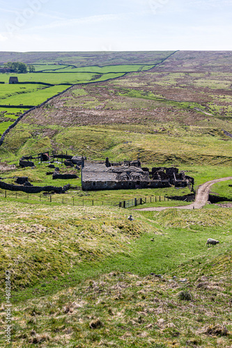 Abandonded buildings at Groverake Mine (lead and fluorspar) on the Pennines at Redburn Common, County Durham UK photo