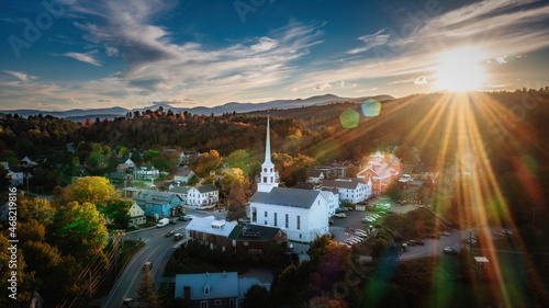 Stowe Sunflare - A drone shot from the little town of Stowe.  The sun was just setting, and my aperture of my camera was set so that I would get the sun rays beaming across the stark white church.