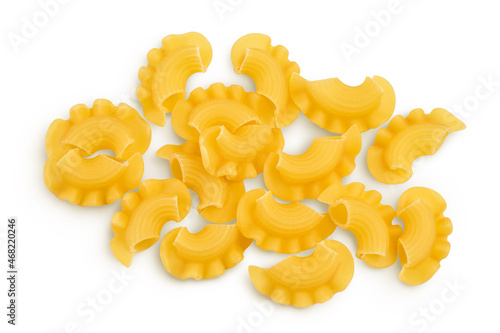 Pasta cornetti creste macaroni isolated on white background with clipping path and full depth of field. Top view. Flat lay