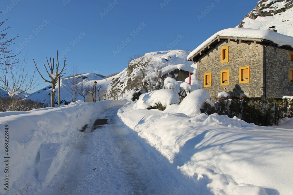 Heavy snowfall in a town in the eastern mountainous area of Cantabrian mountains, León (Spain) Heavy snowfall in a town in the eastern mountainous area of Cantabrian mountains, León (Spain)
